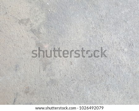 
Gray concrete background with patterned