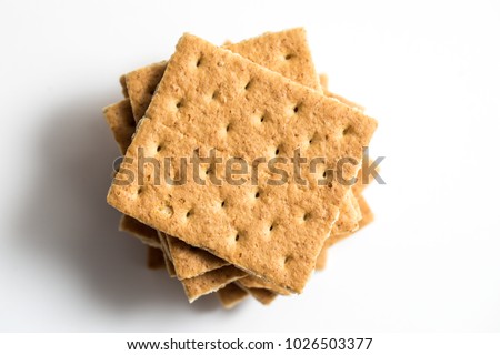Graham cracker photo shot close up with a macro lens and a white background Royalty-Free Stock Photo #1026503377