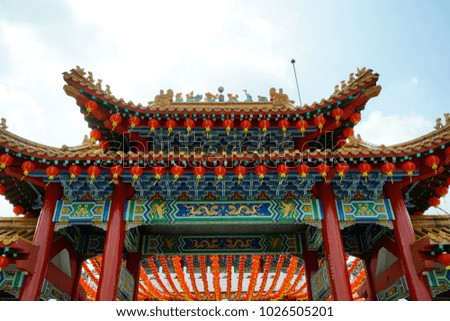 Exterior architecture of  Thean Hou Temple, Kuala Lumpur, Malaysia with hanging red lanterns.