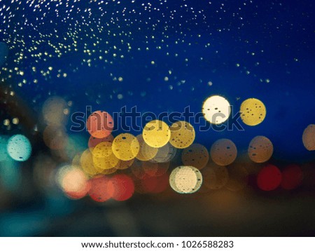 bokeh lights on road side in the night with blue sky