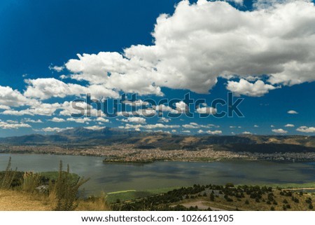 spring in Ioannina city Greece , lake Pamvotis , clouds sky