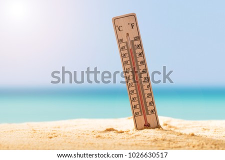 Close-up Of Thermometer On Sand Showing High Temperature Royalty-Free Stock Photo #1026630517