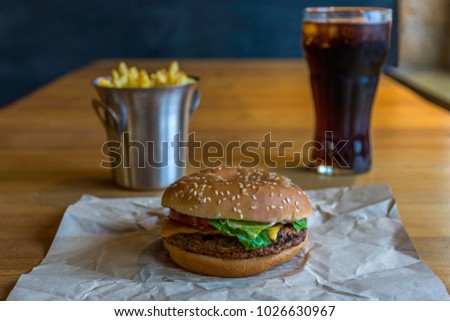 Fast food set big hamburger, french fries and drink.