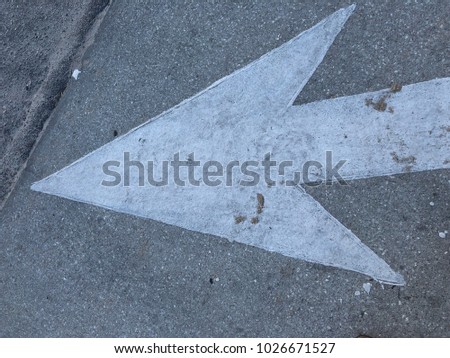 arrow on road asphalt street way white