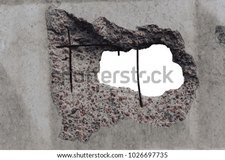 The hole in the concrete wall or fence. Clipping path included for hole shape.