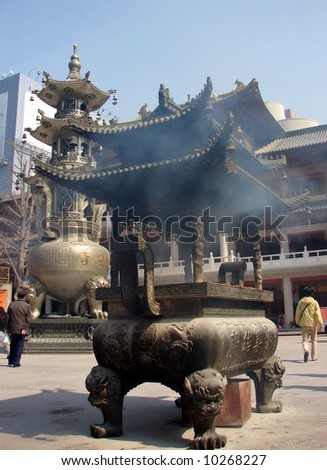 Grunge bronze oriental temple's altar