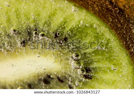 juicy kiwi in soda water