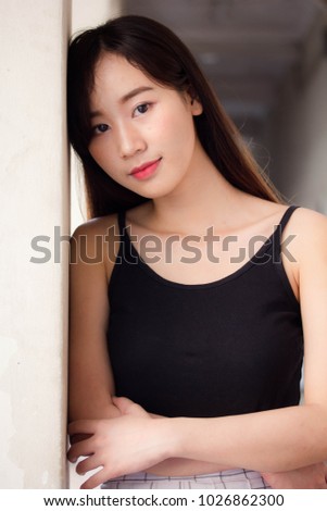 Portrait of thai china adult beautiful girl relax and smile