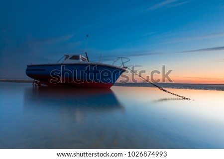 Fishing boat on the dry, Blue boat sunset, Howth Dublin Ireland