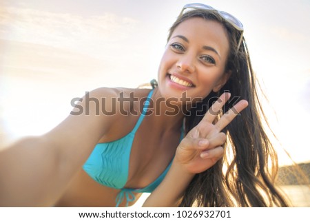 Cheerful woman at the beach