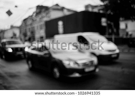 Picture blurred for background abstract and can be illustration to article of traffic. Blurred background abstract and can be illustration to article of traffic in city. black and white photo