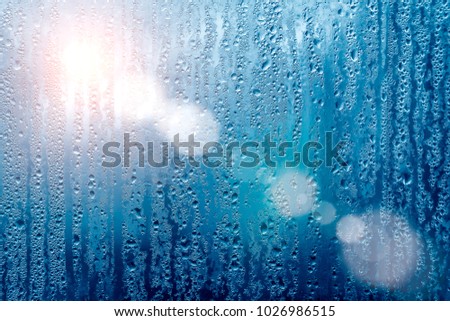 texture background wet drops of water dew on misted glass mist