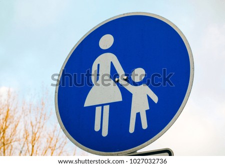 blue pedestrians traffic sign as circle