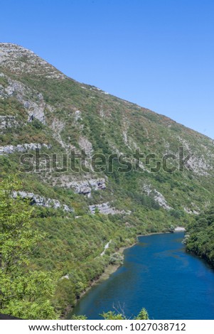 View of a valley with a river in the mountains of Montenegro