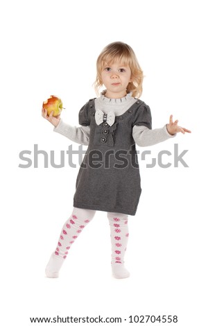 Baby girl eating apple. Isolated on white background