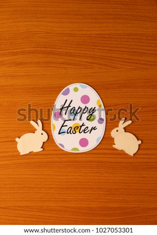 happy easter and egg Wooden rabbit easter on background