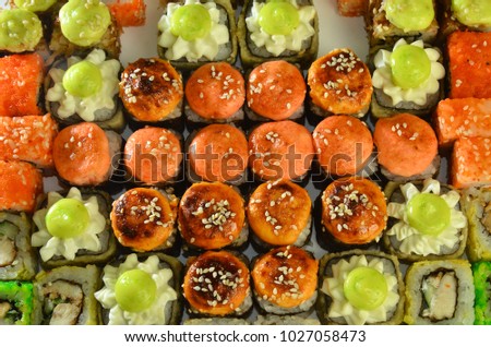 Sushi roll set background top view Japanese food.