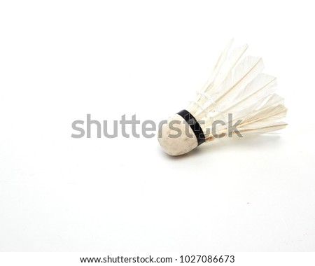 A old shuttlecock isolated on white background