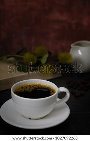 Classic still life with a cup of coffee with copy space, vertical picture.