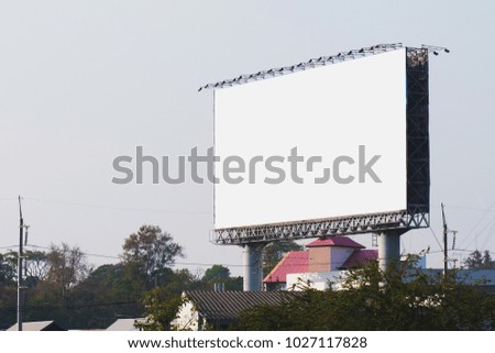 blank billboards in city with blue sky background