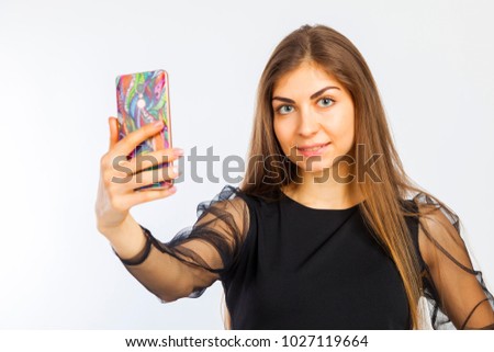beautiful business woman takes herself off by phone