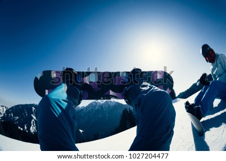 snowboarding legs on winter mountain top