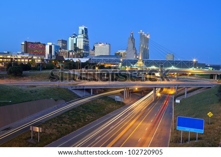 Kansas City. Image of the Kansas City skyline and busy highway system leading to the city.
