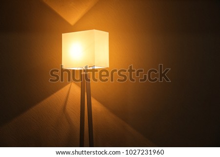 Stylish lamp in dark room