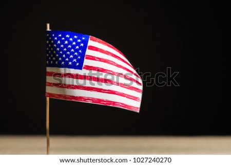 photo of US flag made of paper