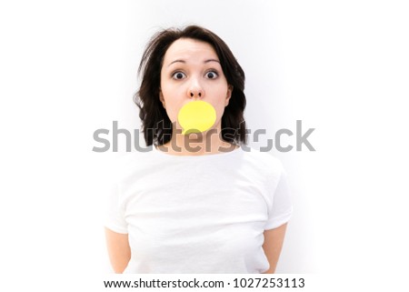 Successful Asian young woman showing a thought sticker, isolated, studio, photo, emotion, surprise, gossip concept.