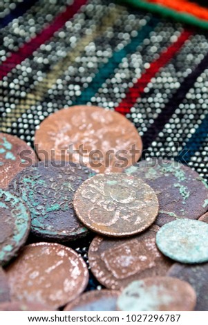 Pile of old coins. Antique rusty coins background. Old Polish and Austrian money. The treasure of the 19 century.