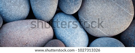 Web banner abstract smooth round pebbles sea texture background
