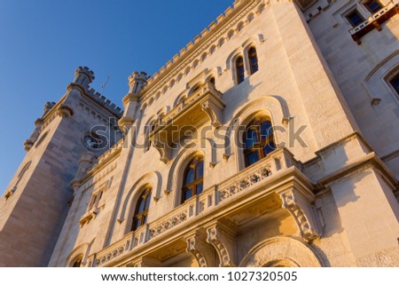 Facade of Miramare castle in Trieste, Italy, at sunset
