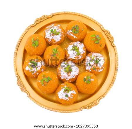 Indian Sweet Motichoor laddoo Also Know as Bundi Laddu or Motichur Laddoo Are Made of Very Small Gram Flour Balls or Boondis Which Are Deep Fried Royalty-Free Stock Photo #1027395553
