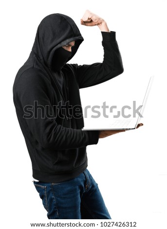 Lucky hacker with his computer on isolated white background