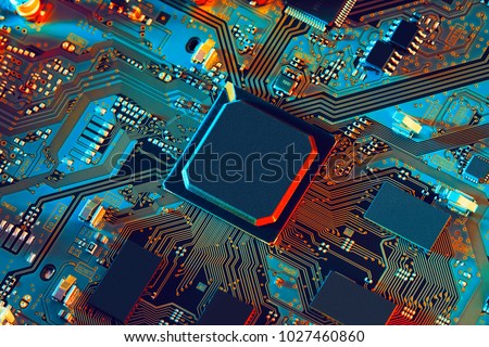 Electronic circuit board close up. Royalty-Free Stock Photo #1027460860