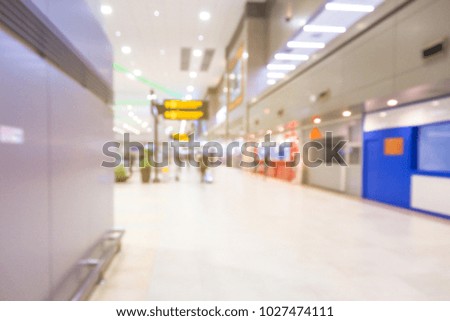 Airport terminal blurred  with bokeh light on the Background. Traveling concept.