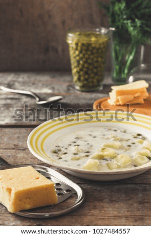 Cheese creamy soup with vegetables
