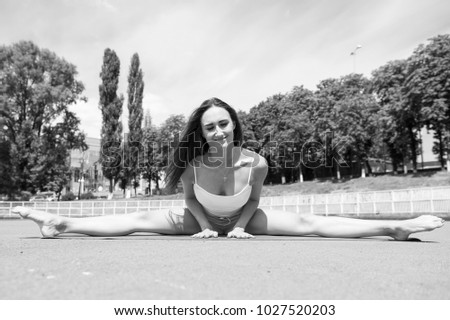 Coach and health. Girl sunny outdoor on fitness mat. Summer activity and energy. Sport and yoga. Woman workout and stretching.