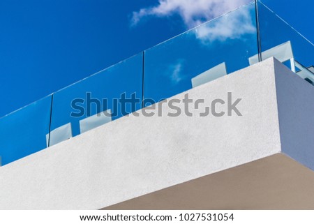 Bar balcony over the beach in Budva, Montenegro, Adriatic Sea. Nice wall for presenting some short text.  Royalty-Free Stock Photo #1027531054
