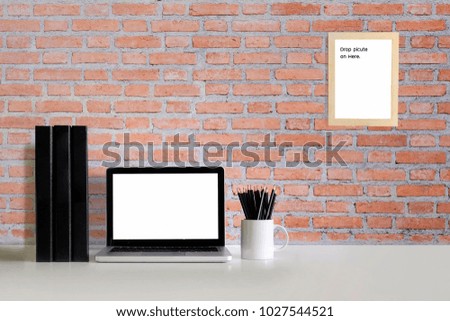 Workspace mockup with laptop computer and other office object on desk.