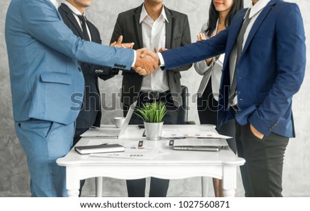 business people Shake hands in  meeting