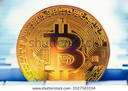Cryptocurrency golden bitcoin coin. Conceptual image for crypto currency, toned