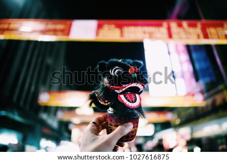 Mini lion dance are sale on Chinese New Year day at Yaowarat (China town) in Bangkok Thailand 
