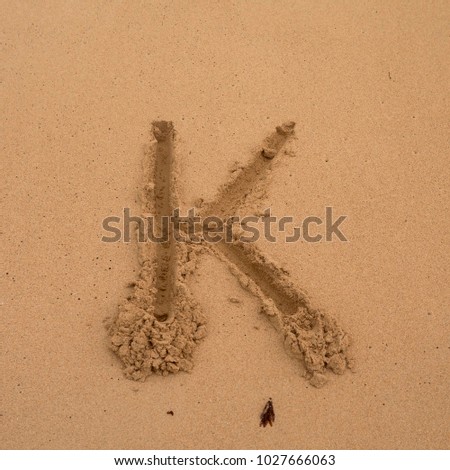 Letters in the sand, alphabet, beach