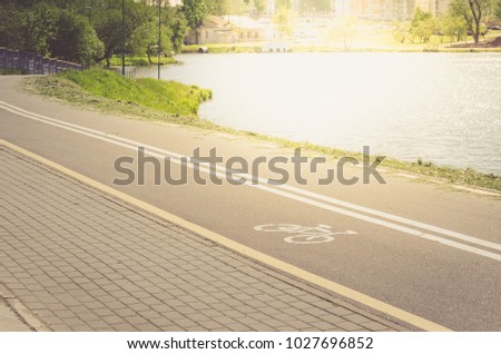 bicycle lane for exercise surround with along reservoir/bicycle lane for exercise surround with along reservoir in sunny day