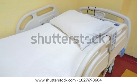 Close up image of empty hospital bed. 