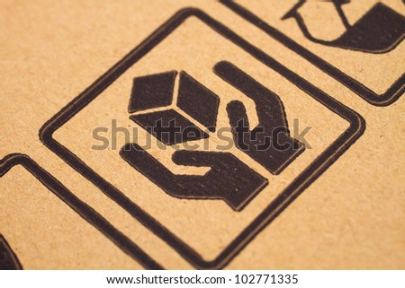 black symbol on cardboard