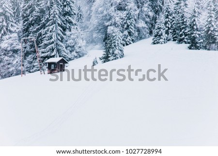 Beautiful winter landscape in the mountains. Cold weather, snow on hills.