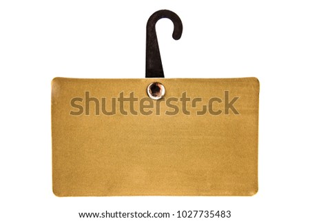 Empty sheet of golden yellow paper, hanging on a plastic  hook. Isolated over white background.tag label with hanger
